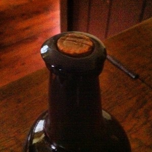 Corked ale bottle.