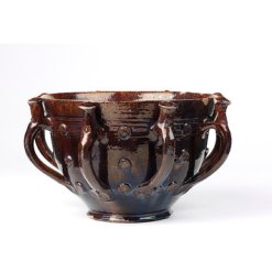 An earthenware wassail bowl from the late 1600s. (Courtesy the Victoria and Albert Museum)